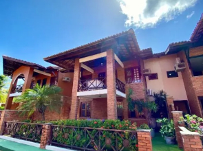 Linda casa Porto das Dunas: 4 suítes, churrasqueira e piscina