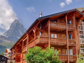 Mountain Exposure Luxury Chalets & Penthouses & Apartments