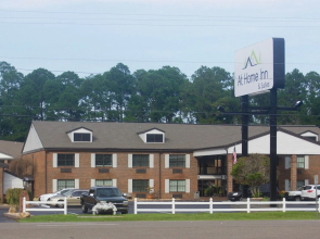 At Home Inn & Suites