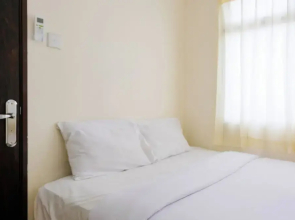 Homey 2BR at Serpong Greenview Apartment