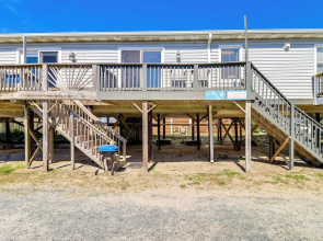 Oak Island Condo w/ Ocean View: Steps to Beach!