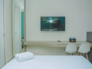Fully Furnished and Comfortable Design Studio Menteng Park Apartment By Travelio
