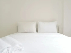 Minimalist and Restful 2BR at Podomoro Golf View Apartment