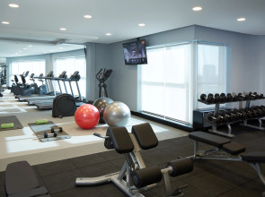 Отель Naumi Dubai