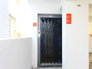 OYO 10701 Moukthi Apartment