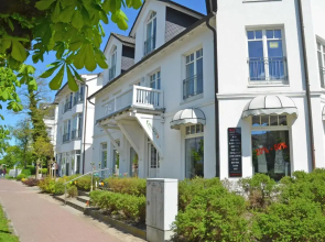 Villa Saxonia F640 WG 13 im ersten OG mit Wintergarten, strandnah
