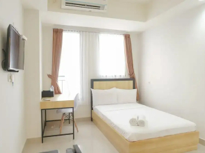 Minimalist And Homey Studio At Evenciio Margonda Apartment