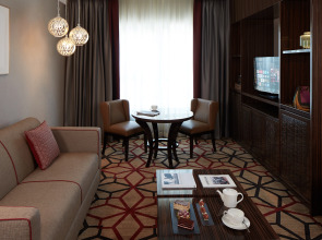 Отель Naumi Dubai