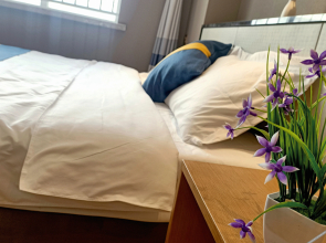 Qingdao boyuewan Resort Apartment(青岛泊悦湾度假公寓（中铁世界博览城店）)