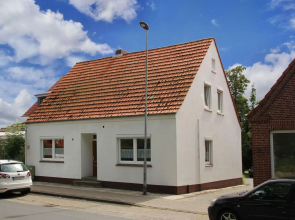 Apartment With a High Chair and bed