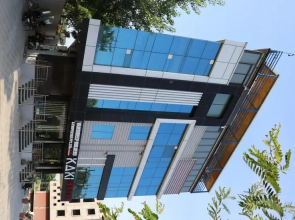 Fabhotel Prime Kaki