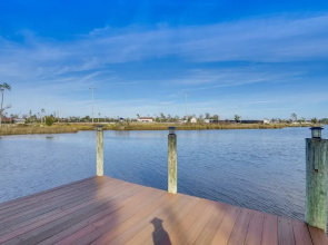 Panama City Waterfront Escape: Fenced Yard & Dock!