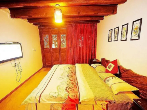 Lijiang Caicaijia Inn