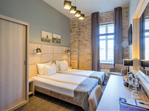 Отель Wellton Centrum Hotel & Spa