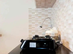 Comfortable Fully Furnished Studio Green Pramuka City Apartment By Travelio