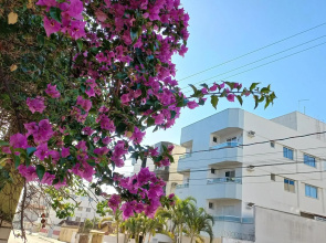 Lindo apartamento com Wi-Fi a 370m da Praia do Morro, próximo ao Marlim Azul e à Av Paris