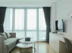 Comfortable Studio Room at Capitol Suites Apartment By Travelio
