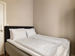 Fløyen Suites - Private Rooms I Location