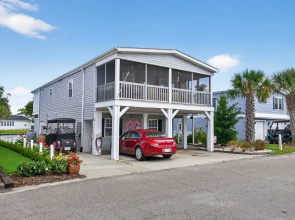 Coastal Retreat Steps From Private Beach 2 Bedroom Apts