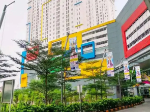 Modern 2BR with City View at Bassura Apartment By Travelio