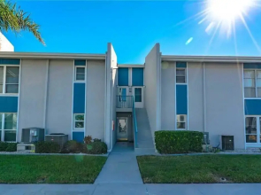Madeira Beach Yacht Club 151H by Distinctive Beach Rentals