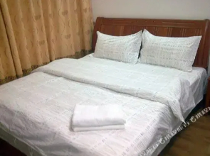 她他酒店式公寓(玉林市中医院凯旋世纪广场店)