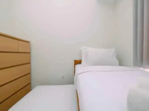 Cozy and Beautiful 2BR at Springlake Summarecon Bekasi Apartment By Travelio