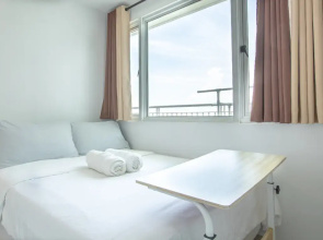 EDSA QC SM North 2BR Vacation Condo | Balikbayan