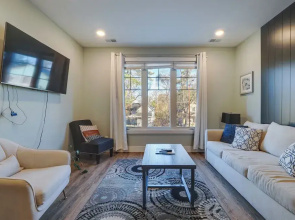 Walk to Front St! Traverse City Condo Near Skiing