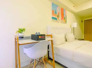 Homey and Simply Studio Meikarta Apartment By Travelio