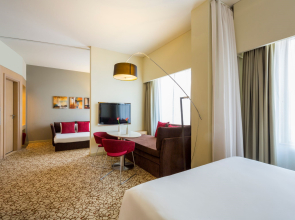 Отель Novotel Suites Mall Avenue Dubai