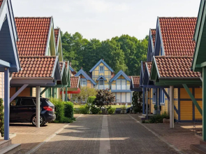 Cozy Holiday Home with Wood Burning Stove near Water