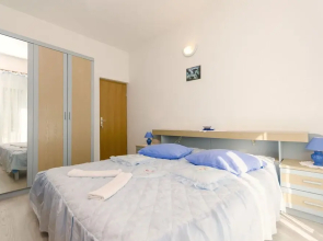 Apartment and Rooms Ema
