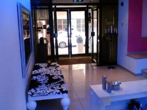 Les Palmiers Beach Boutique Hotel & Luxury Apartments