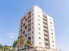 Modern Gem with Stunning Balcony by Sea N Rent