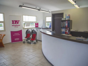 Nicolaus Club Alimini Smile