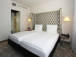 Отель Arcotel John F 