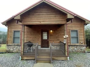 Charming cabin with an Amazing view! - pet and motorcycle friendly! 2 Bedroom Cabin by RedAwning