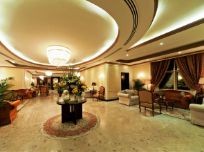 Magnum Hotel & Suites West Bay