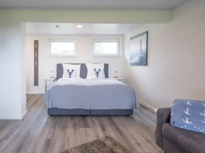 Bungalow Neuwarft, Wohnung 1