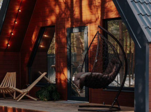 A-frame in a pine forest near Lake Klyuchik