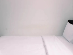 Warm And Simply Studio Room At Azalea Suites Apartment
