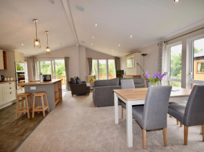 Bluebell is a Stunning Lake Side Lodge Sleeps 4 Close to Ryde