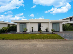 Villa With Covered Terrace and Jetty on the Water