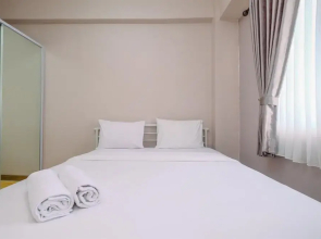 Homey and Cozy Living 2BR Podomoro Golf View Apartment