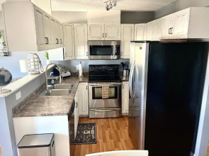 Top Floor Riverfront Condo with Stellar Sunsets!