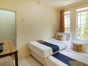 Spot On 3988 Kost Carmelia Baranangsiang Syariah