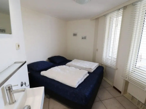 Inviting Dune Chalet in Hollum Near Golf Course