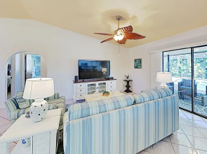 New Listing! Sparkling W/ Caged Pool & Lanai 3 Bedroom Home