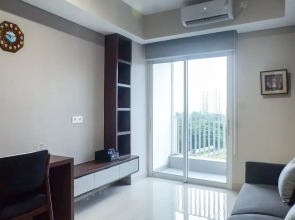 Classy 1BR Apartment with Pool View at Grand Sungkono Lagoon